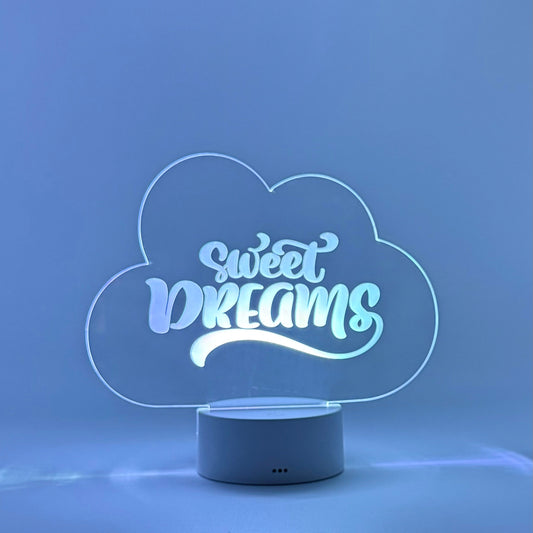 Cloud-shaped night light with 'sweet dreams' text on a blue background